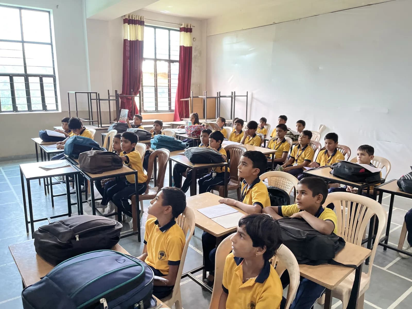 Pupils at their desks during a classroom lesson