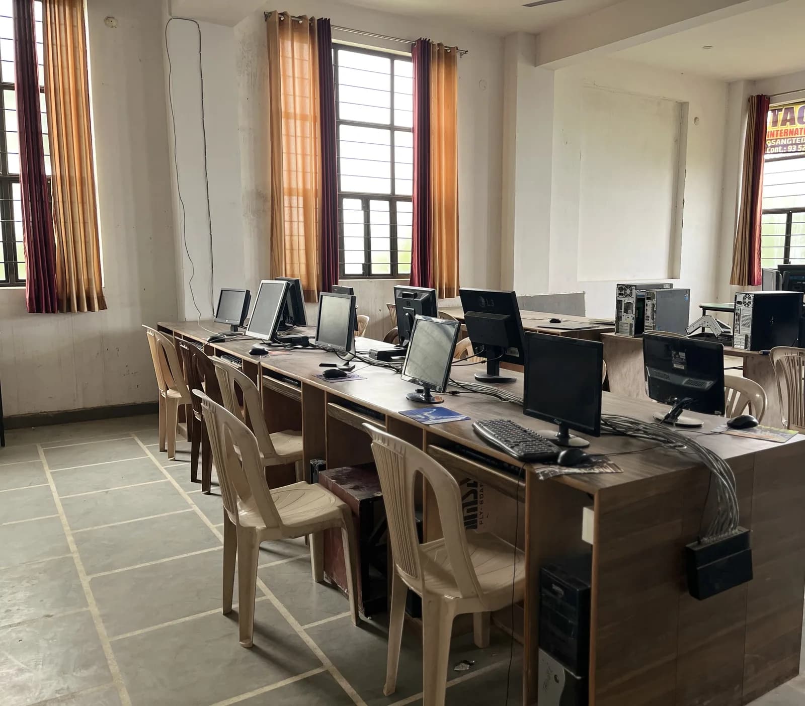 The computer laboratory with rows of workstations